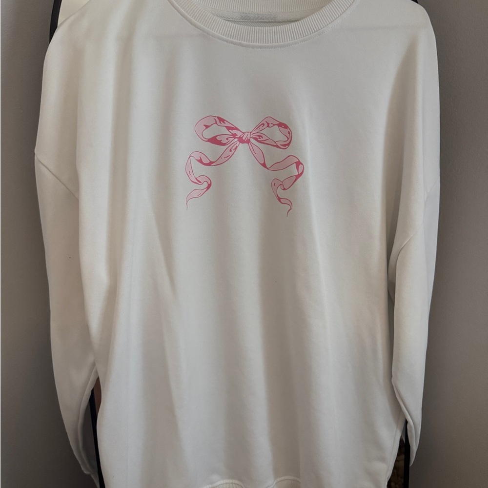 White Sweatshirt with Pink Bow Design